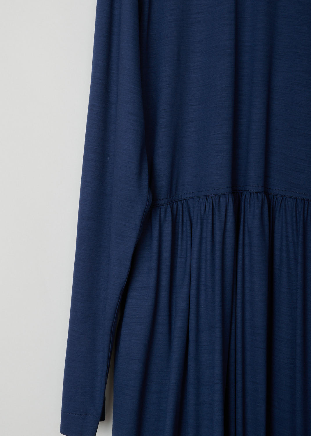 SOFIE Dâ€™HOORE, NAVY BLUE LONG SLEEVE DRESS, DEMURE_WOJE_NAVY, Blue, Detail, This navy blue mid-length dress features a round neckline, a plain long sleeve bodice and a twisted balloon skirt. A single side pocket can be found concealed in the seam. 
