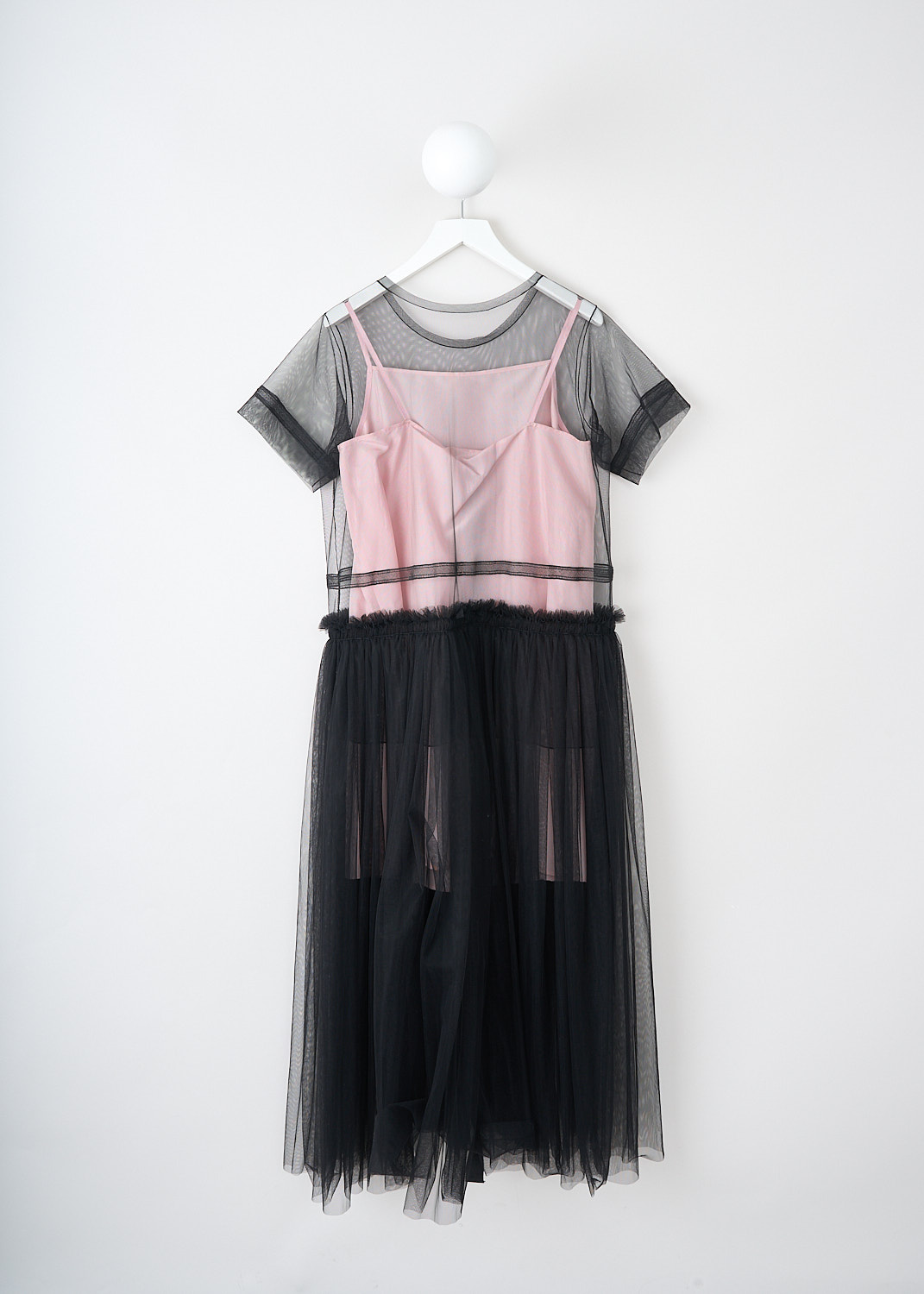 Sofie d'Hoore, Black tulle Dominic maxi dress, DOMINIC_NYCE_02_BLACK, Black, Pink, Back, This black tulle Dominic maxi dress has a round neckline and short sleeves. The dress has a boxy bodice with embroidered detailing and a pleated skirt. The sheer tulle fabric creates a layered look with the detachable pink slip dress. 


