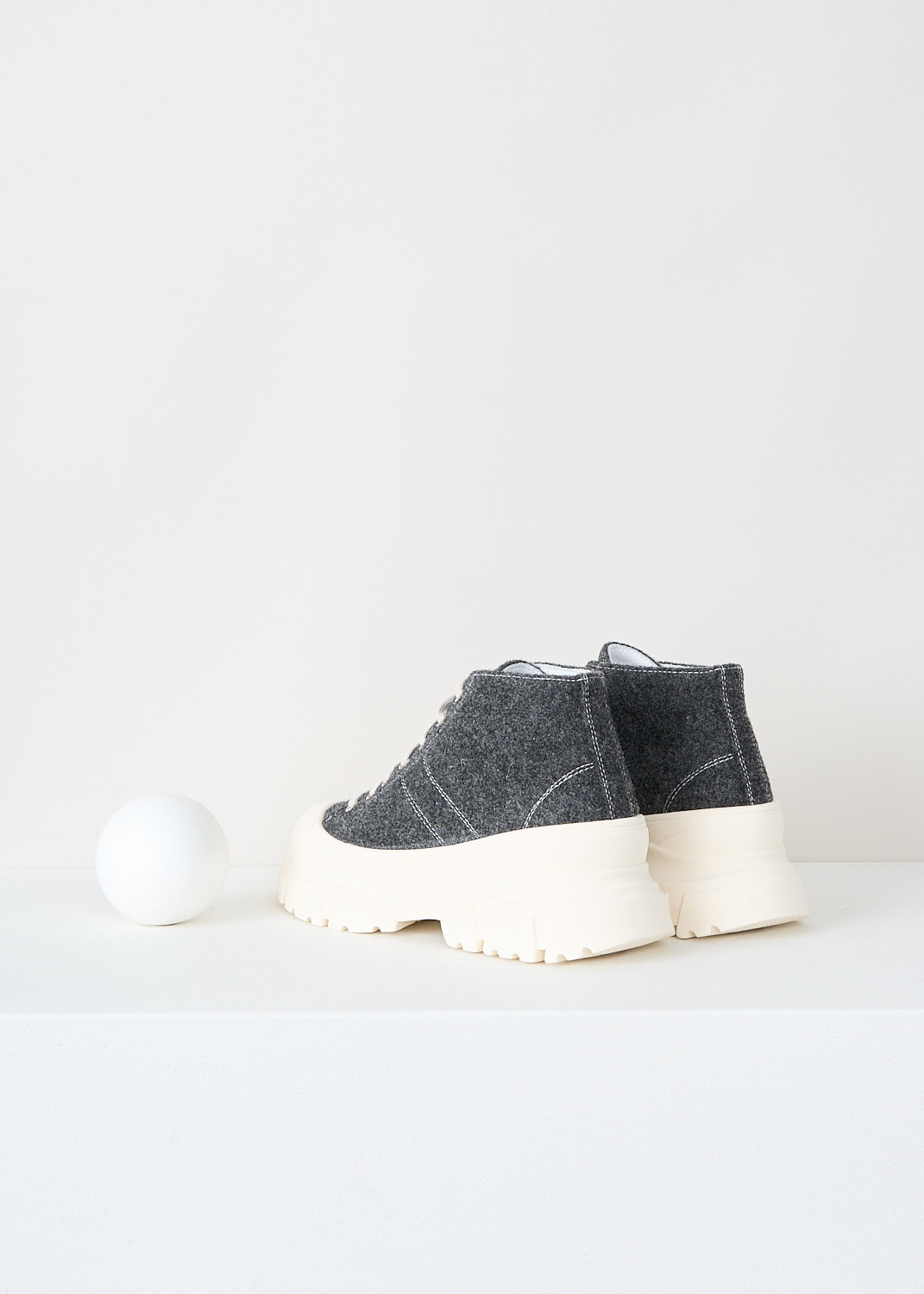 Sofie d'Hoore, Felted wool Fairway sneakers in Shadow, W24_FAIRWAY_WFELT_02_WOOL_SHADOW, Grey, Back, These felted wool high-top Fairway sneakers in the color Shadow have a front lace-up closure with white laces. Contrasted white stitching can be found throughout. These sneakers have a round toe with a white toe-cap and chunky white sole.
