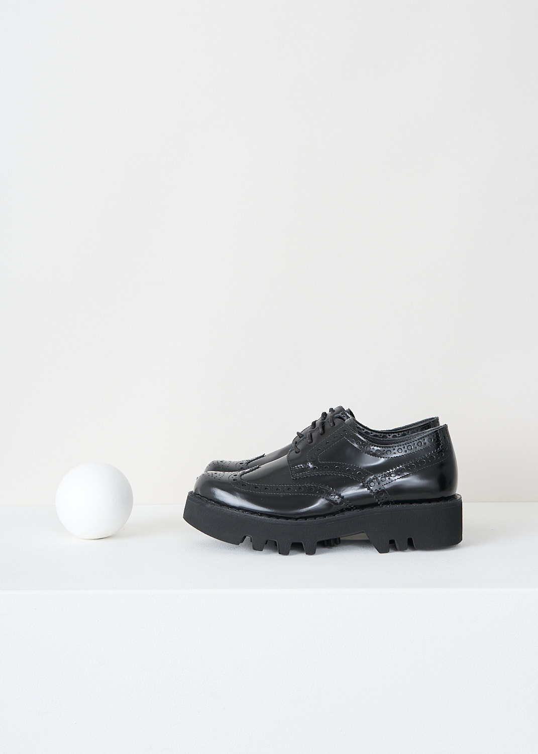 Sofie d'Hoore, Flores brogues in black, W24_FLORES_LVATO_02_BLACK, Black, Side, These black leather Flores brogues have a lace closure and an almond toe. These shoes have decorative perforations throughout. 
