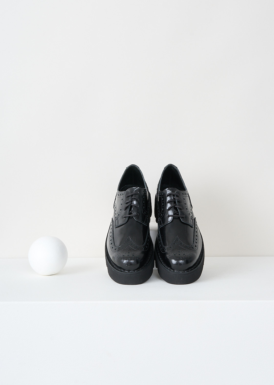 Sofie d'Hoore, Flores brogues in black, W24_FLORES_LVATO_02_BLACK, Black, Top, These black leather Flores brogues have a lace closure and an almond toe. These shoes have decorative perforations throughout. 
