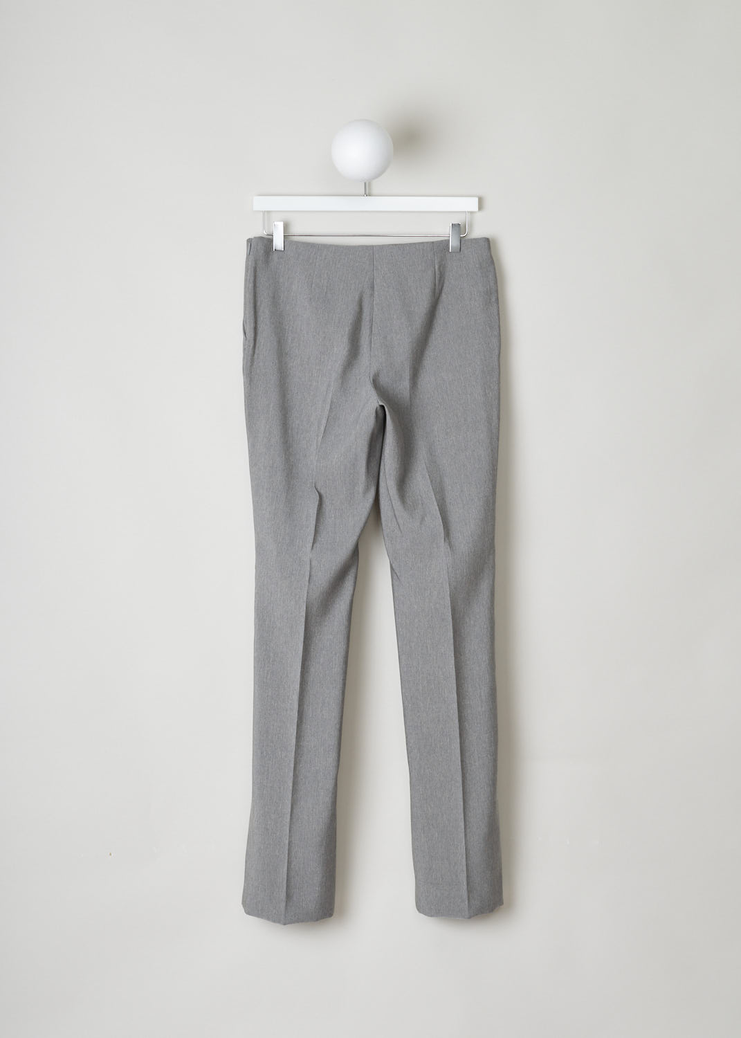 The Row, Heather grey pants without waistband, Ladan_pant_4775WI_030_MDM_GRY_MLNGE, Grey, Back, Heather grey straight-fitted pants without waistband. These pants have slanted pockets on either side and an invisible zipper fastening on the side. In the front and back, along the length of the legs, centre creases can be found.
