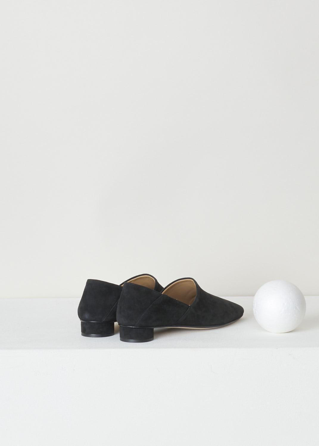 THE ROW, BLACK SUEDE SLIPPER, NOELLE_F1000_L25_BLK, Black, Back, Minimalistic black suede slipper. The slip-in model features a rounded toe vamp. The sober design is exactly what makes these shoes so beautiful.
