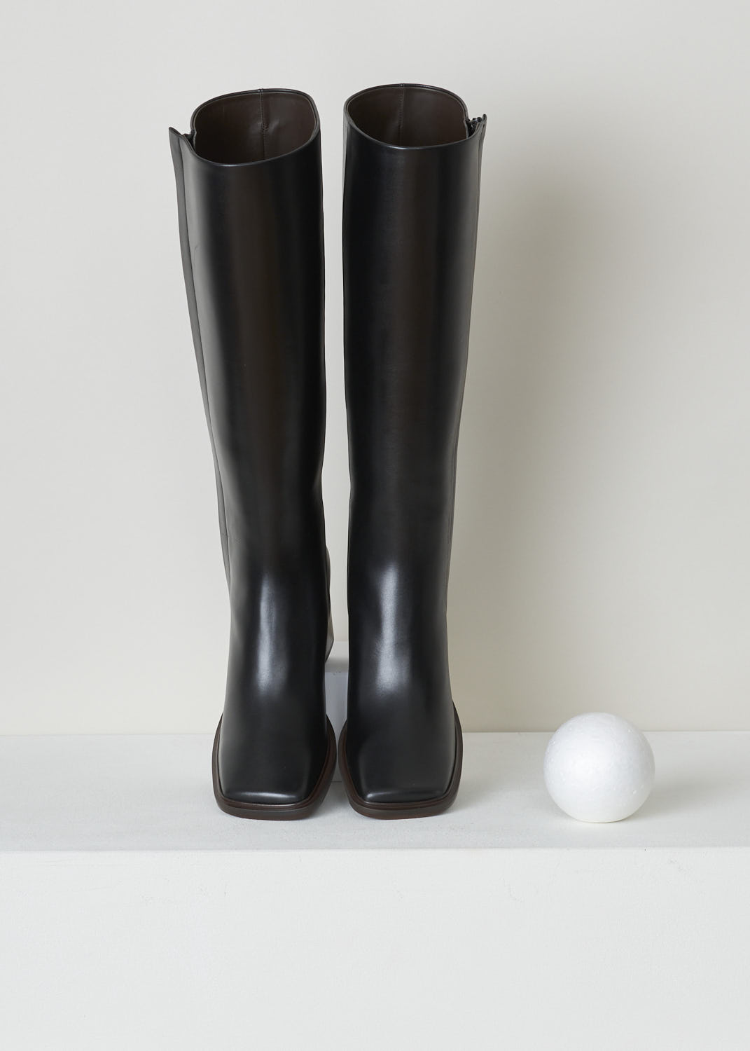 THE ROW, BLACK HEELED BOOTS, PATCH_HIIGH_BOOT_F1221_L52_BLK, Black, Top, Sleek black boots with block heel. These boots hit right below the knee and have a square toe. Concealed by an elegant leather strip, these boots have a zipper on the outside of the leg.