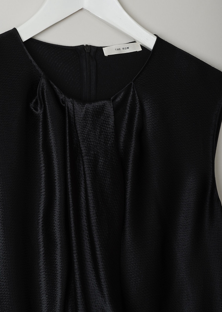 THE ROW, HAMMERED SATIN TOP IN BLACK, SHIRA_TOP_4923WI_616_BLACK,  Black, Detail, This hammered satin sleeveless top in black has a round neckline with a pleated front detailing. In the back, a concealed centre zip can be found. The top has a wider silhouette.
