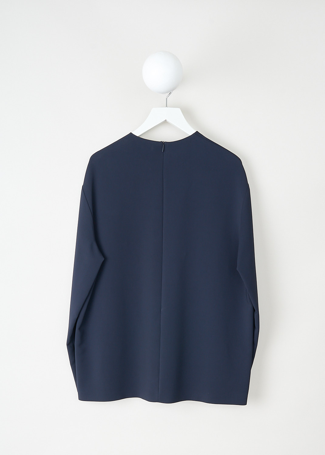 The Row, Tamar top in Dark Navy, TAMAR_TOP_5653_W1925_DARK_NAVY,  Blue, Back, This Tamar top in dark navy has a round neckline a long sleeves with dropped shoulders. In the back, a concealed centre zip functions as the closure.
