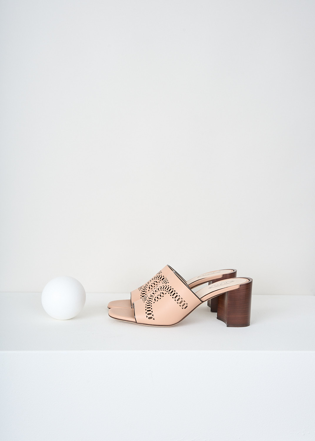 Tod's, Beige open-toe mules, XXW02L0HZ80_MID_M033, Beige, Side, These beige open-toe mules have a broad strap with a laser-cut pattern. These mules have a stacked brown block heel.

