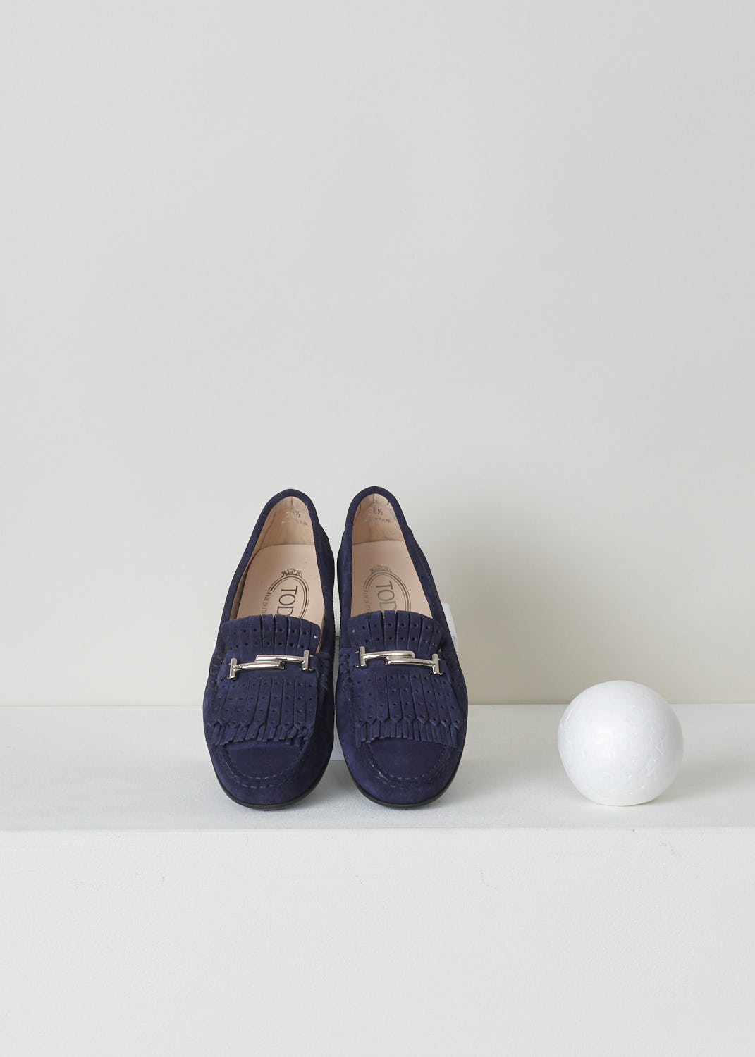 TODS, BLUE SUEDE MOCASSINS WITH BUCKLE, XXW0LU0Y470RE0U824, Blue, Top, Blue suede loafers with a rounded toe. These shoes feature fringed tassels and a silver-toned buckle. Noticeable are the rubber soles with studded profile that extends further to the rear trim.
