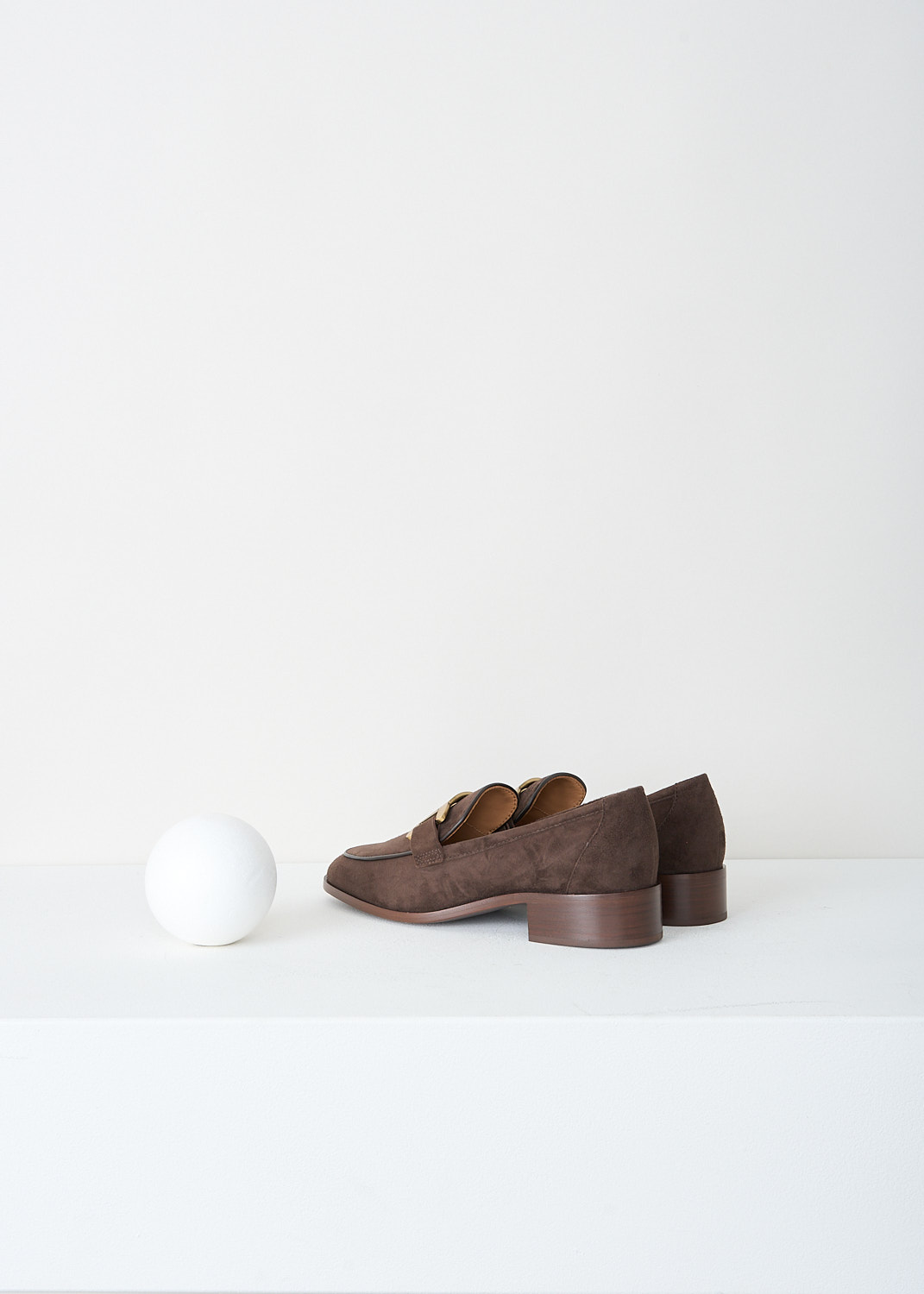 Tod's, Dark brown loafers with gold-tone buckle, XXW28K0FR00_D8W_S611, Brown, Back, These Dark Brown suede loafers have a almond toe and a gold-tone logo buckle over the topside. These shoes have brown leather soles with a small heel.
