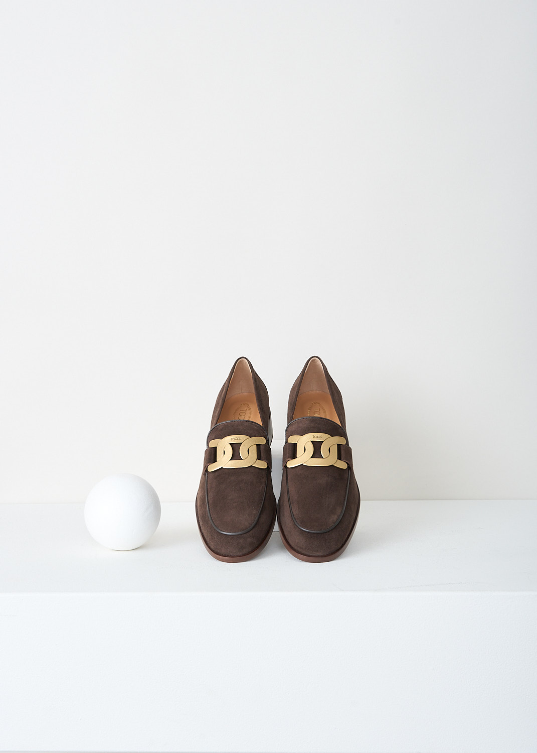 Tod's, Dark brown loafers with gold-tone buckle, XXW28K0FR00_D8W_S611, Brown, Top, These Dark Brown suede loafers have a almond toe and a gold-tone logo buckle over the topside. These shoes have brown leather soles with a small heel.
