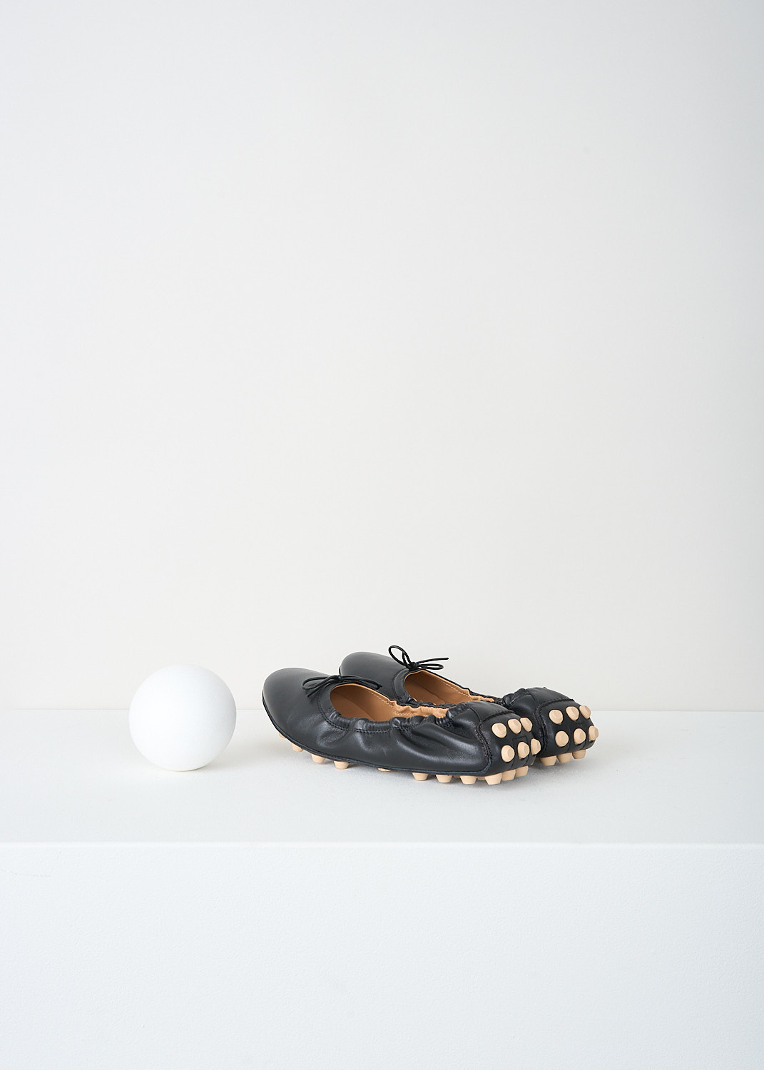 Tod's, Black ballerina flats with studded sole, XXW76K0HD20_SOM_B999, Black, Back, These black ballerina flats have a round toe with a decorative bow and a flexibel studded sole. 
