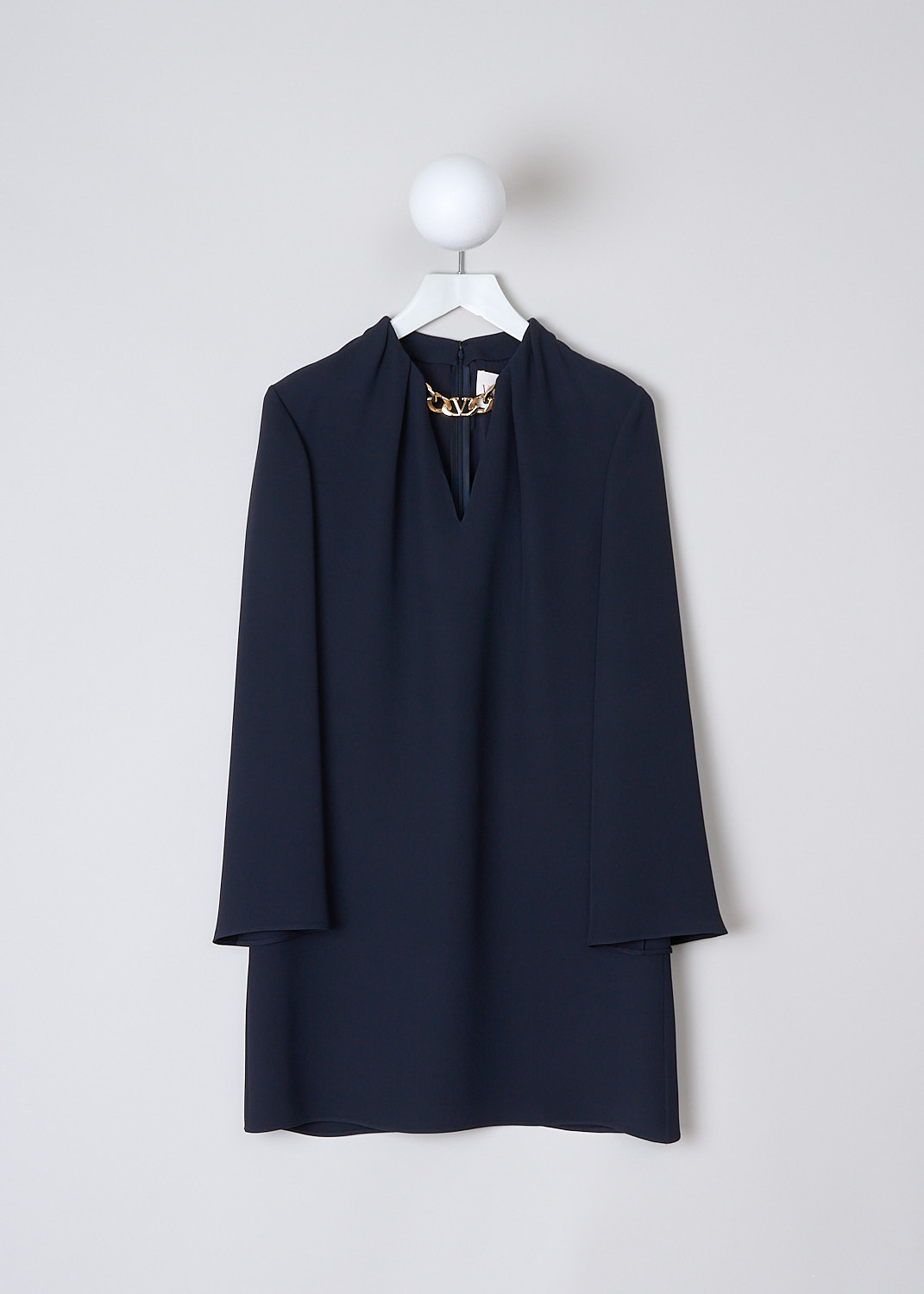 VALENTINO, DARK BLUE SILK DRESS WITH GOLD-TONE CHAIN DETAIL, 1B3VAZE71MM_598, Blue, Front, This dark blue mini dress has a V-neckline with a gold-tone V-logo chain. The dress has long bell sleeves. In the back, the dress has a concealed centre zip. The dress has a straight hemline. 
