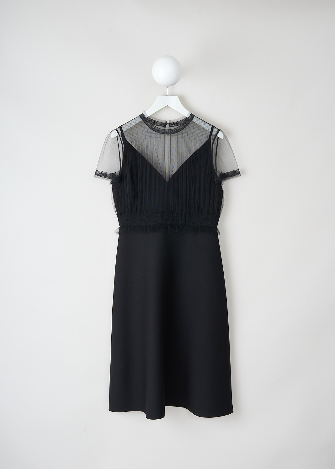 Black Valentino midi dress with strappy V-neck, sheer mesh overlay, high round neckline, short sleeves, lace trim and A-line skirt, front view, Kiki’s Stocksale Maastricht designer boutique