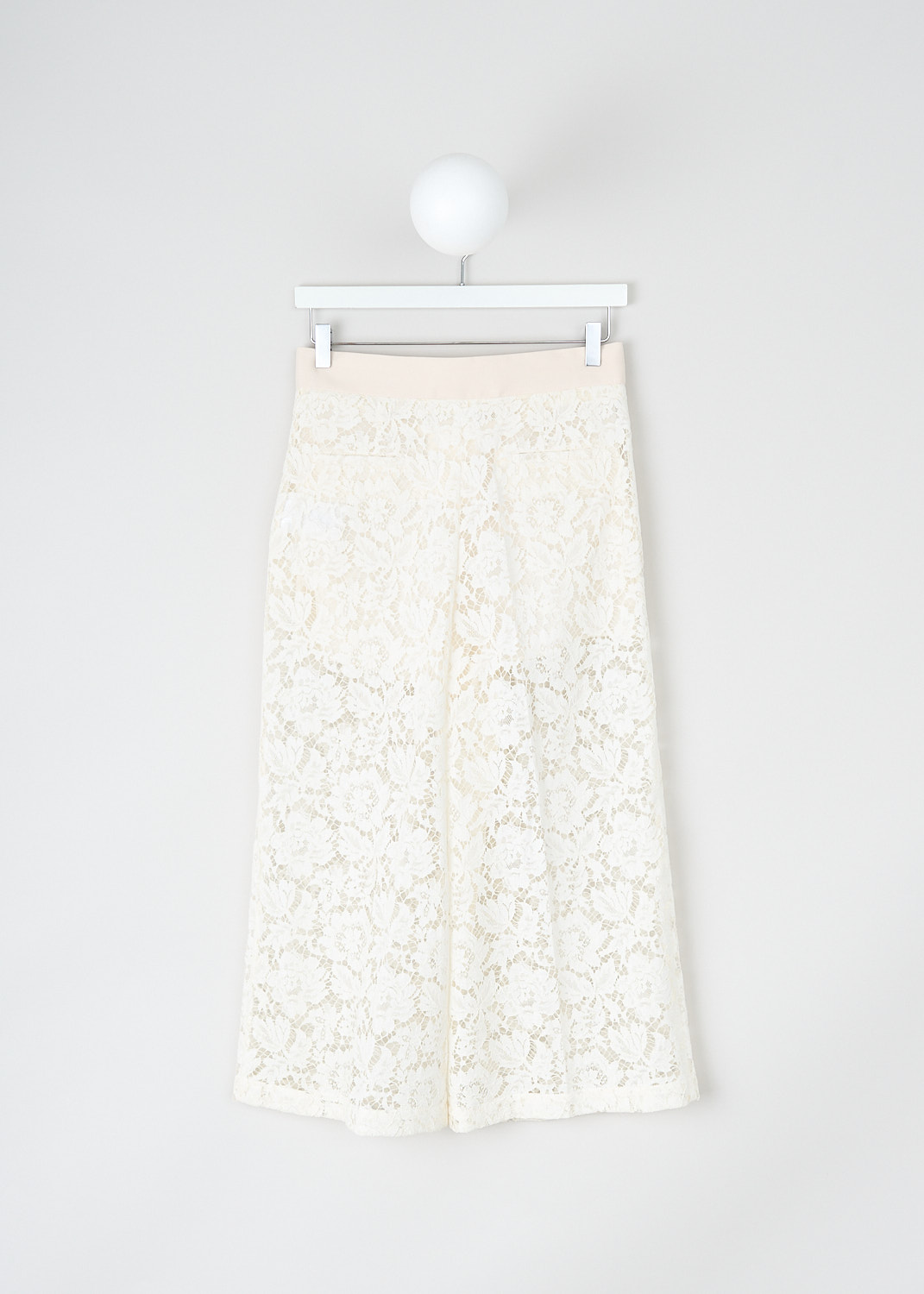 Valentino, Off-white lace culotte pants, PB0RB2C01EC_A03, White, Back, These off-white lace culotte pants have a broad waistband with a button and concealed zip closure. These pants have slanted pockets in the front and welt pockets in the back. The cropped wide pant legs have pressed creases. The external lace fabric is partly see-through but the pants come with a detachable lining with short pant legs.
