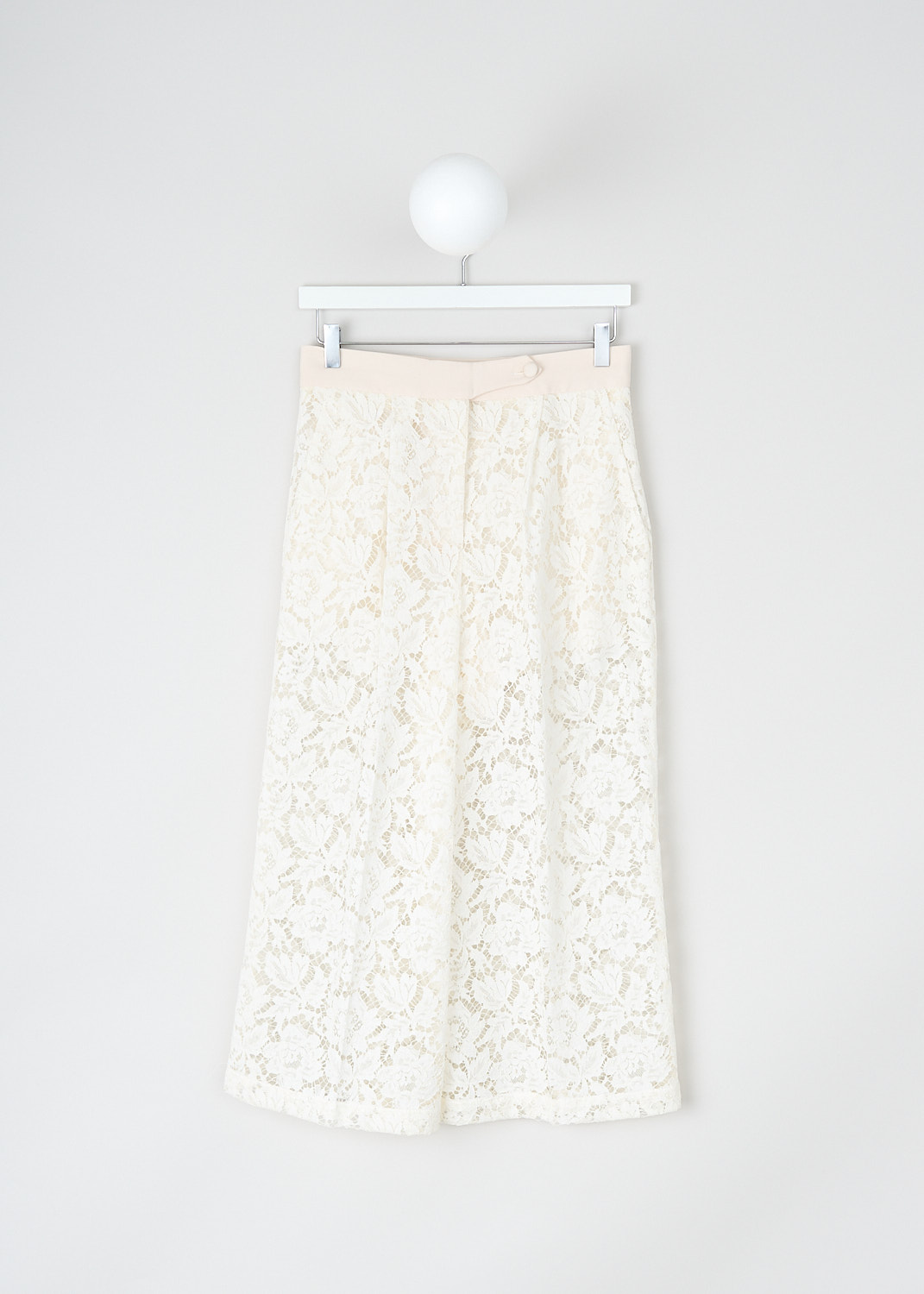 Valentino, Off-white lace culotte pants, PB0RB2C01EC_A03, White, Front, These off-white lace culotte pants have a broad waistband with a button and concealed zip closure. These pants have slanted pockets in the front and welt pockets in the back. The cropped wide pant legs have pressed creases. The external lace fabric is partly see-through but the pants come with a detachable lining with short pant legs.
