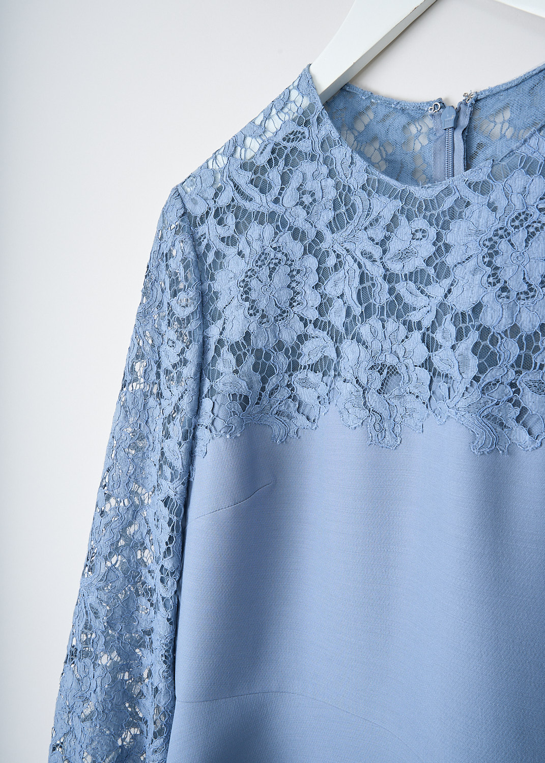 Valentino, Light blue lace dress, TB3VALZ4360_394, Blue, Detail, This light blue midi dress has a round lace neckline and lace three-quarter sleeves. The dress has a seam around the waist that divides the top from the skirt. In the back, a concealed centre zip functions as the closure. The dress is fully lined. 
