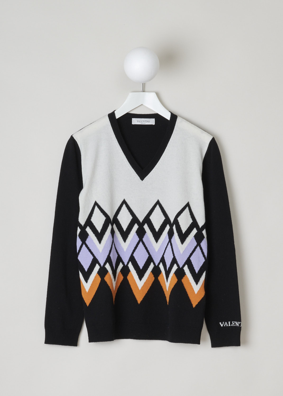 Valentino, Multi-colored argyle pattern sweater, UB3KC15S5N8_K92, black white orange, front. A black sweater, coloured white on the front which is decorated with a lovely multi-colored argyle patter. Featuring a v-shaped neckline and long sleeves.