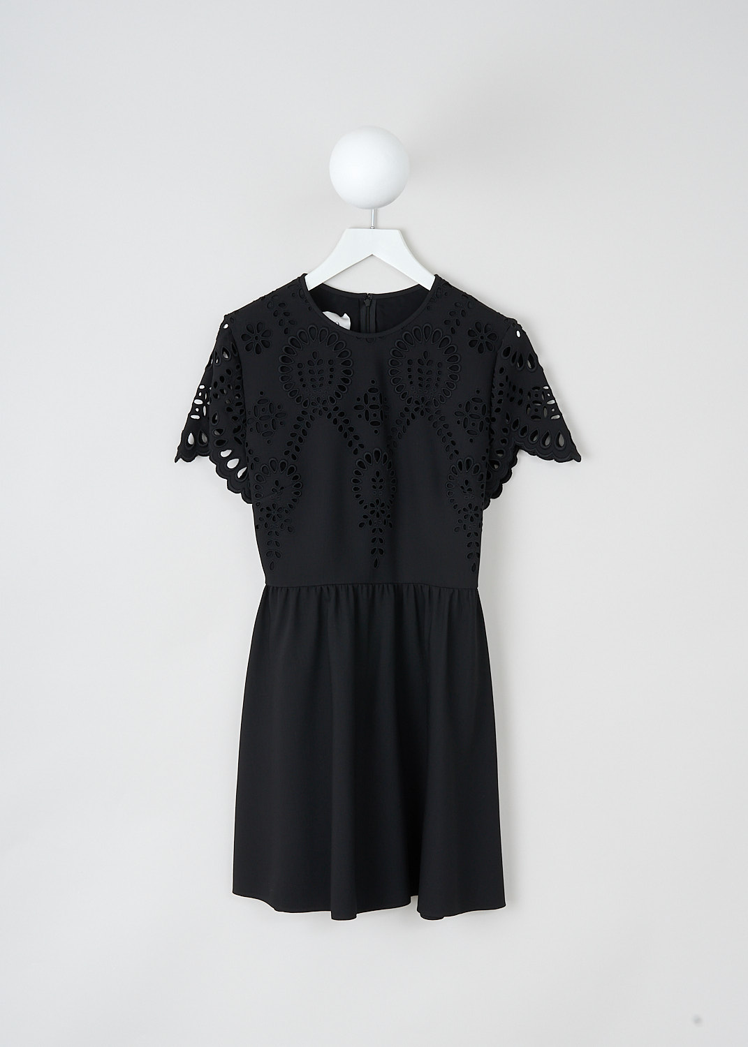 Valentino, Black broderie anglaise mini dress, WB3VAWF06GR_0NO, Black, Front, This black broderie anglaise mini dress has a short-sleeve bodice with a round neckline and a flares skirt with slanted pockets. The dress is fully lined. In the back, a concealed centre zip functions as the closure.
