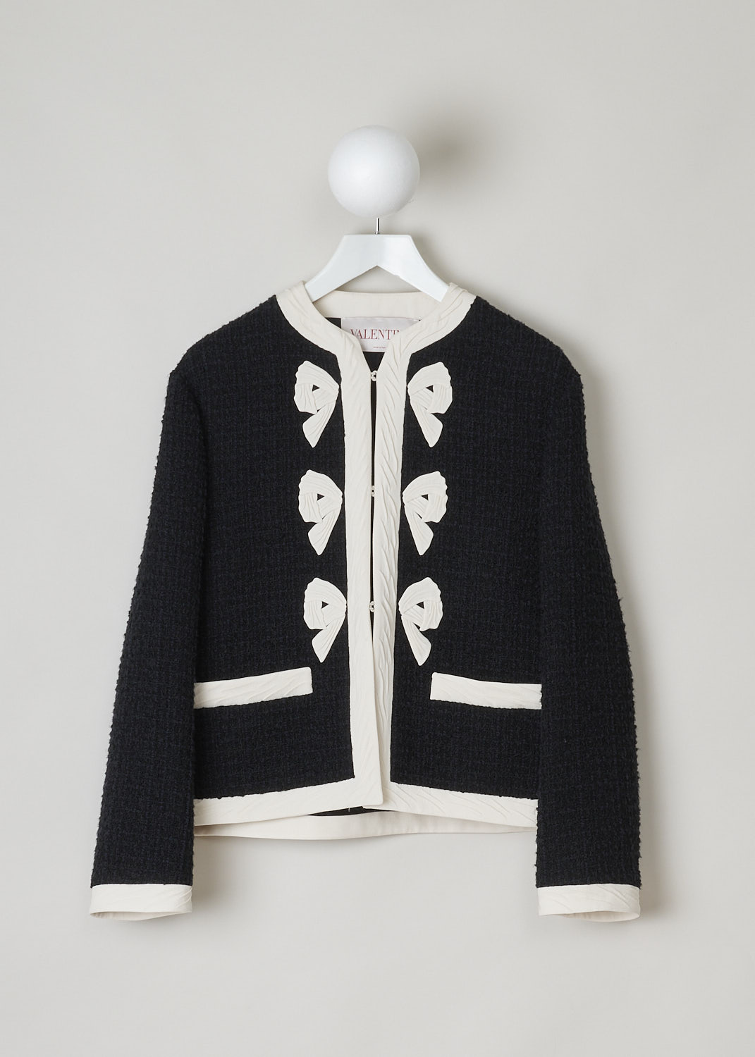 Black and white boucle jacket with bow detail at Kiki's Stocksale