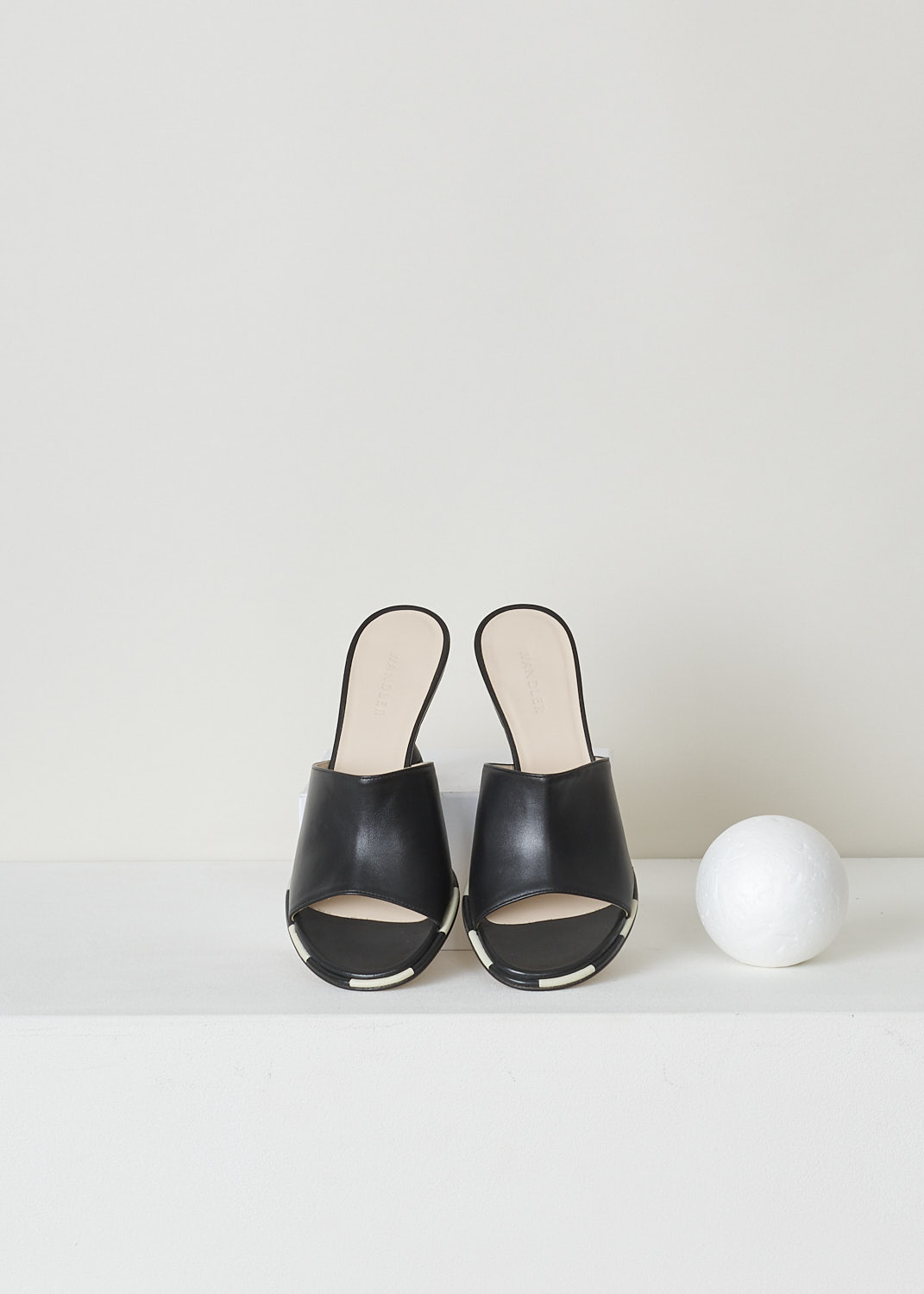 WANDLER, BLACK HEELED MULES, 22202_701204_3248_AGNES_MULE_BLACK_MIX, Black, Top, These black heeled mules have a rounded open-toe with contrasting white stripes decorating the trim. The slip-on mules have a mid-height trapezoid shaped heel.
