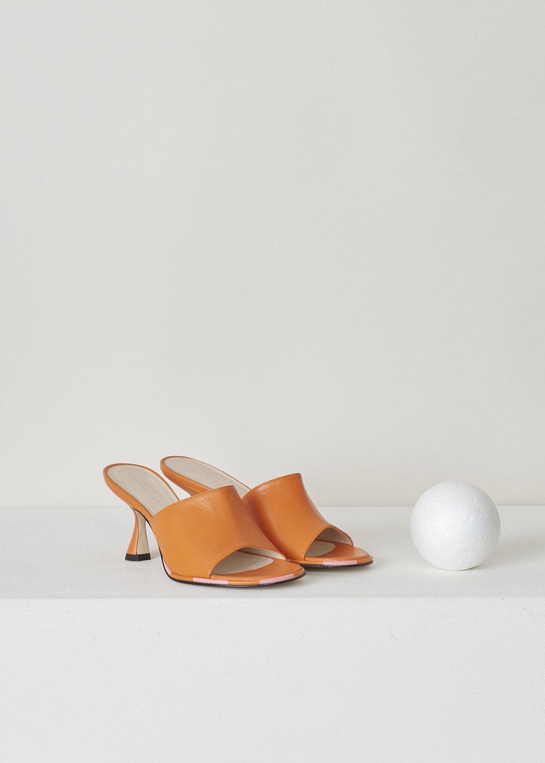 WANDLER, ORANGE HEELED MULES, 22202_701204_2209_AGNES_MULE_PUNCH_MIX, Orange, Pink, Front, These orange heeled mules have a rounded open-toe with contrasting pink stripes decorating the trim. The slip-on mules have a mid-height trapezoid shaped heel.
