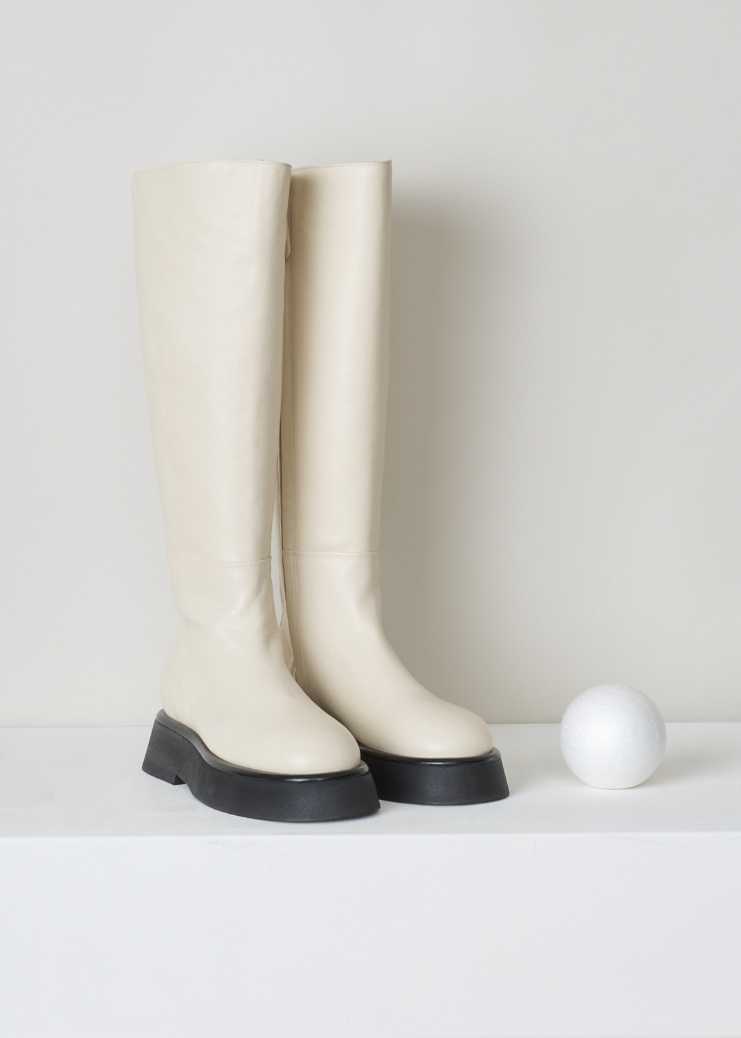 Wandler, Full-length white rosa boot, 21208_601204_1062_moon, white, front, Made out of the softest kind of leather being lambskin, featuring a full length concealed zipper. The thick flat sole flares out a bit, adding power to this minimalistic design. 