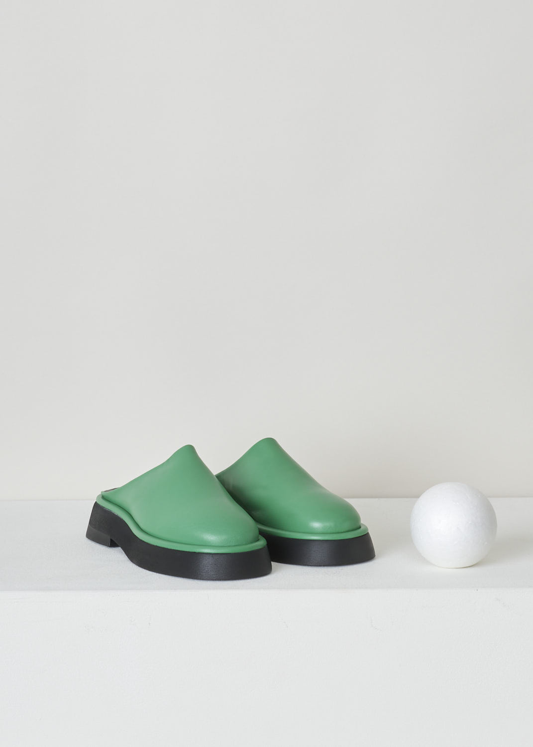 WANDLER, EMERALD GREEN SLIDES, ROSA_SLIDE_22202_741201_2687_EMERALD, Green, Front, These emerald green slip-on slides have a round toe section and flat thick, rubber sole. 
